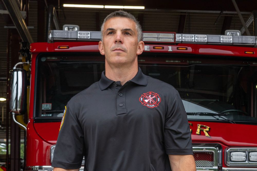 Article Cover: Firefighter walks out of Station in Blauer uniform with Blauer logo