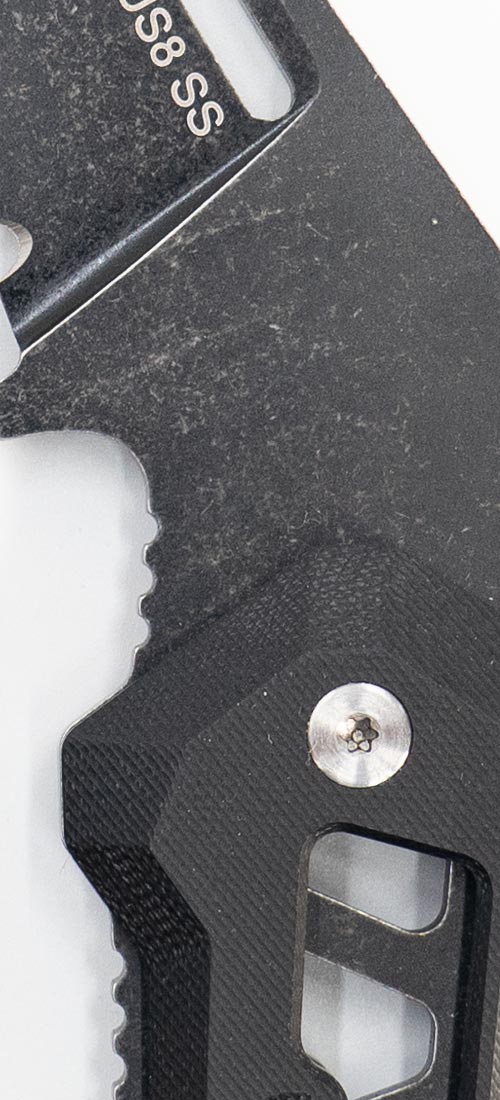 Close up image of stainless steel wharncliffe blade on Sidekick Fixed Blade Knife