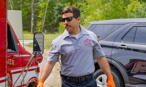Responder wears the Bicomponent Polo Shirt in Gray