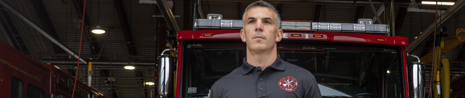 Article Cover: Firefighter walks out of Station in Blauer uniform with Blauer logo