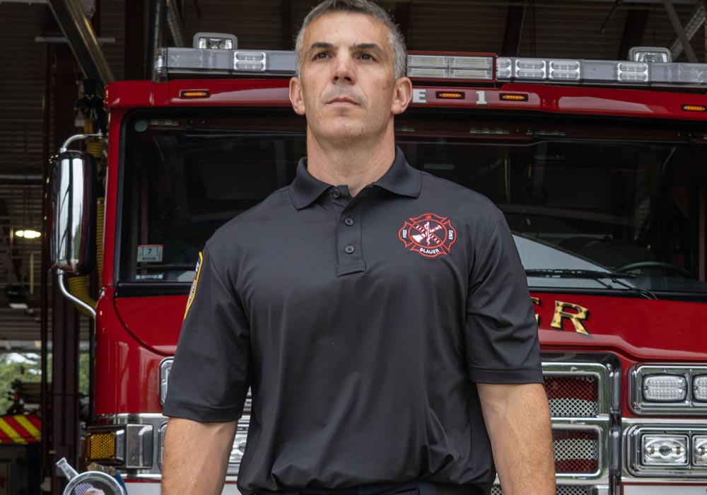 Article Cover: Firefighter walks out of Station in Blauer uniform with Blauer logo