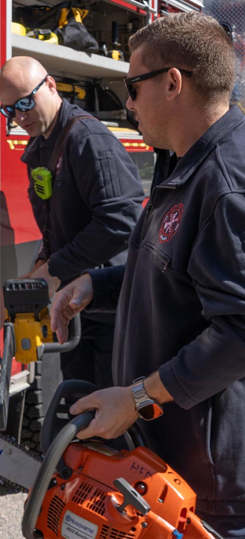 Close up image of stainless steel wharncliffe blade on Sidekick Fixed Blade Knife