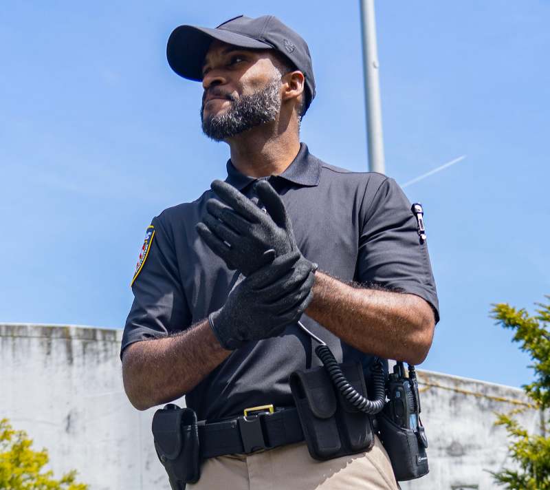 Officer wears a Blauer Polo, Bike Gloves, and FlexRS Airvent Hat in Spring Officer wears a Blauer Polo, Bike Gloves, and FlexRS Airvent Hat in Spring