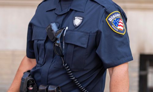 An officer wears the TenX BDU Shirt