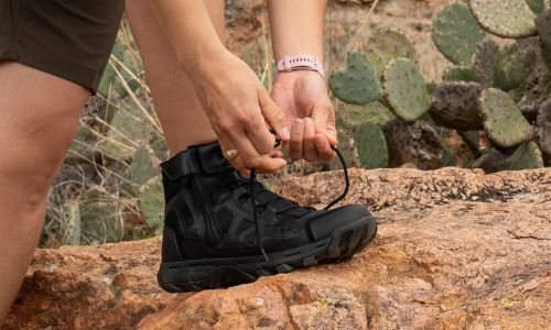 Female officer wears the Women's Rift Boots