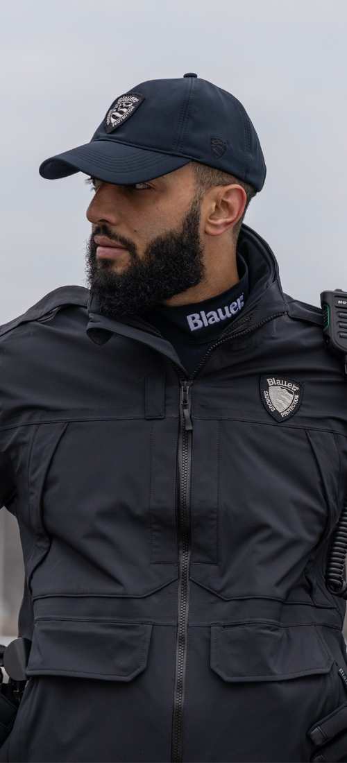 In rainy weather, a bike officer wears a moisture wicking turtleneck and lightweight, weatherproof jacket