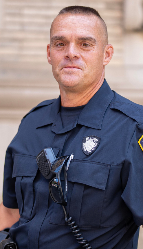 An officer wears the TenX BDU Shirt